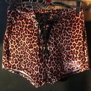 Backbite leopard print grommet shorts